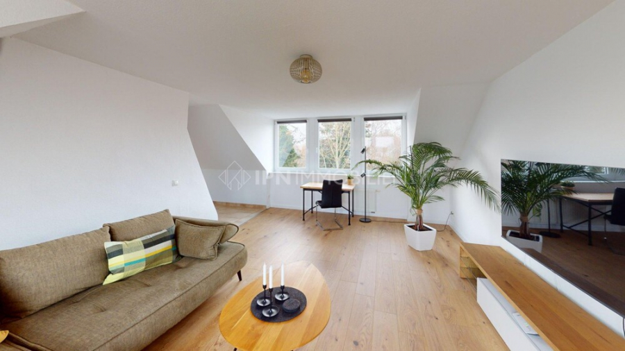 Lichtdurchflutete Dachgeschosswohnung mit Loft-Charakter - Foto 3