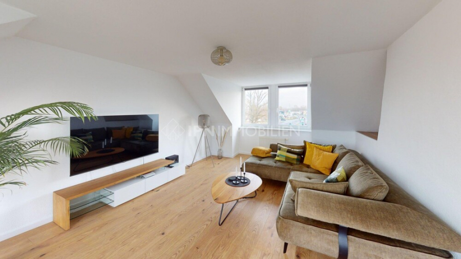 Lichtdurchflutete Dachgeschosswohnung mit Loft-Charakter - Foto 1