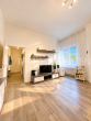 Wohnzimmer - Charmante 2-Zimmer Wohnung mit Balkon in ruhiger Lage