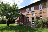 Ansicht - Mehrfamilienhaus mit 3 WE und Garagen in Sanitz