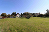 Grundstück - Provisionsfrei – Einfamilienhaus mit Ausbaumöglichkeit, Garage & Bauland!