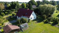 Luftbild - Provisionsfrei – Einfamilienhaus mit Ausbaumöglichkeit, Garage & Bauland!